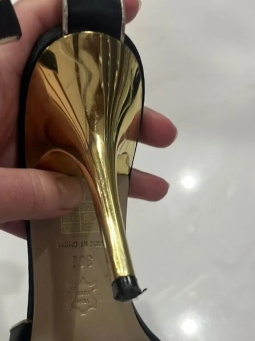 Karen Millen Black and Gold Heels with Sleek Design